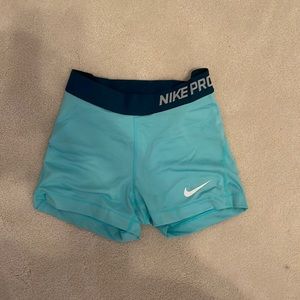 green nike pros